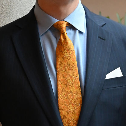 Man wearing the Beauty and Brains silk tie, inspired by the neurons